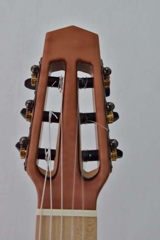 The headstock is also with  pear wood